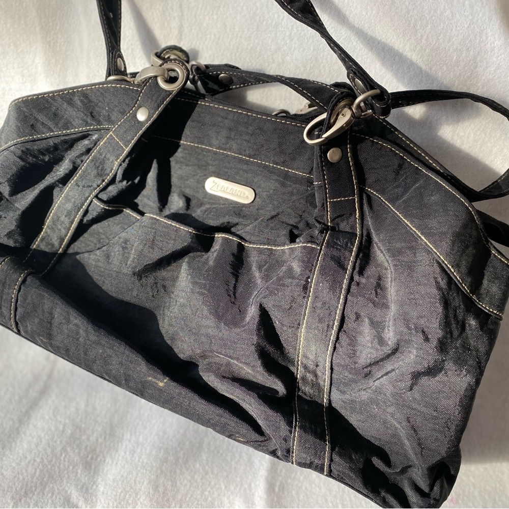 Roomy and rugged purse, very gently used.